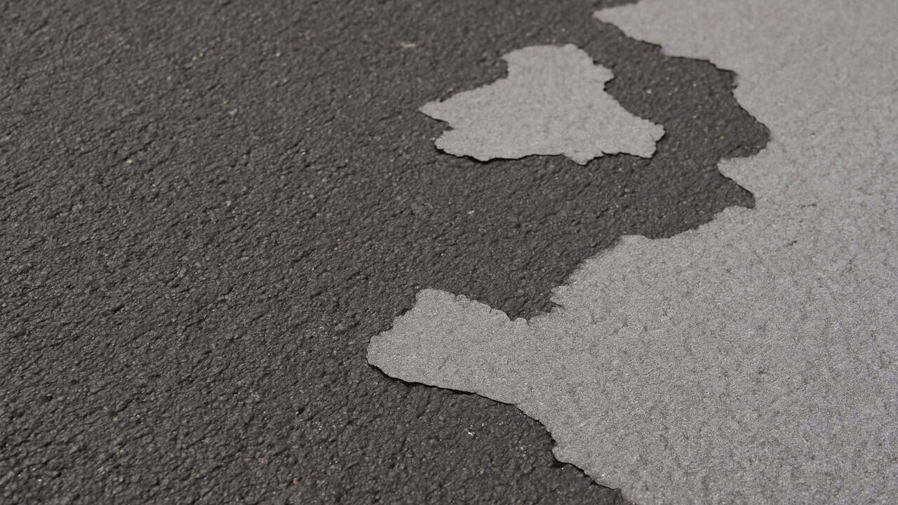 Driveway sealer peeling